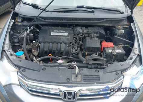 2012 Honda Insight Ex z USA, uszkodzony, nr VIN JHMZE2H71CS002076